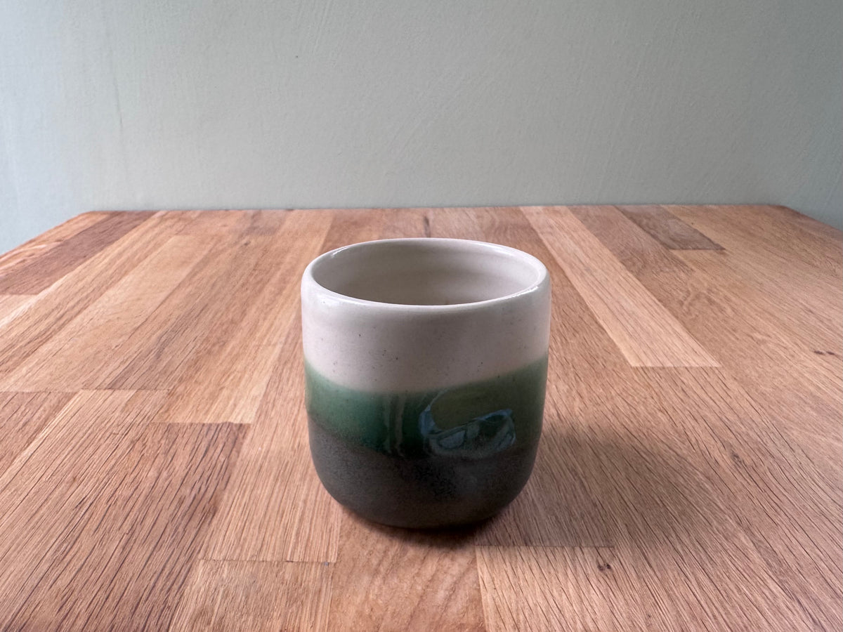 Handmade Ceramic Dimple Cup in a Green and White Glaze